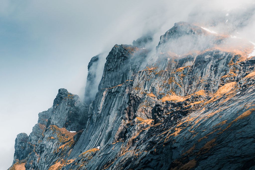 Mountains under low clouds