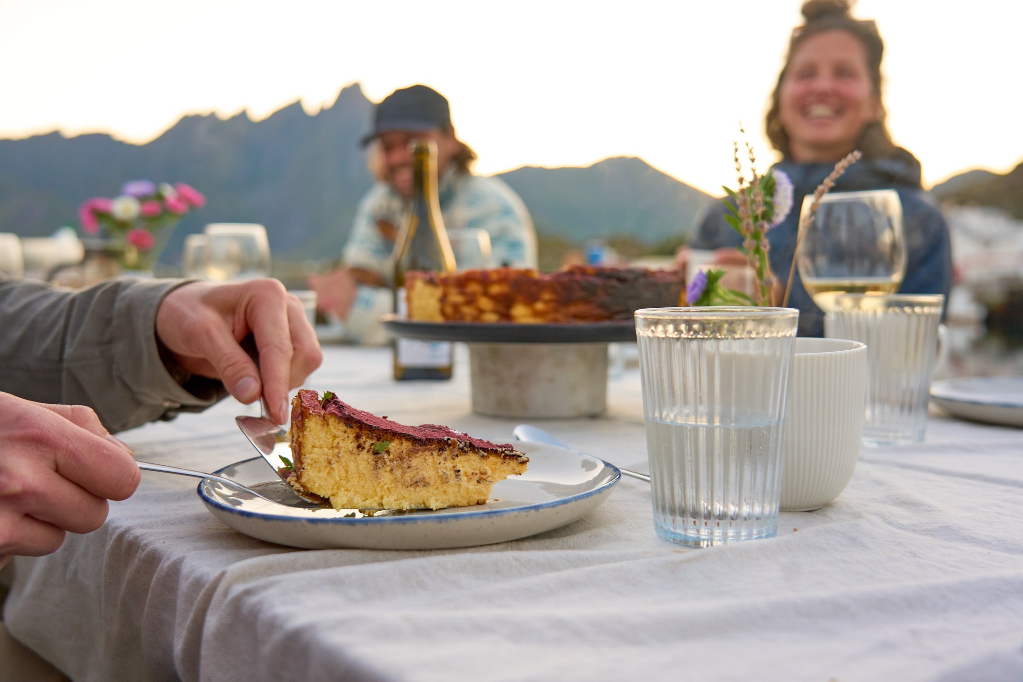 Food and conversation outdoors in Lofoten