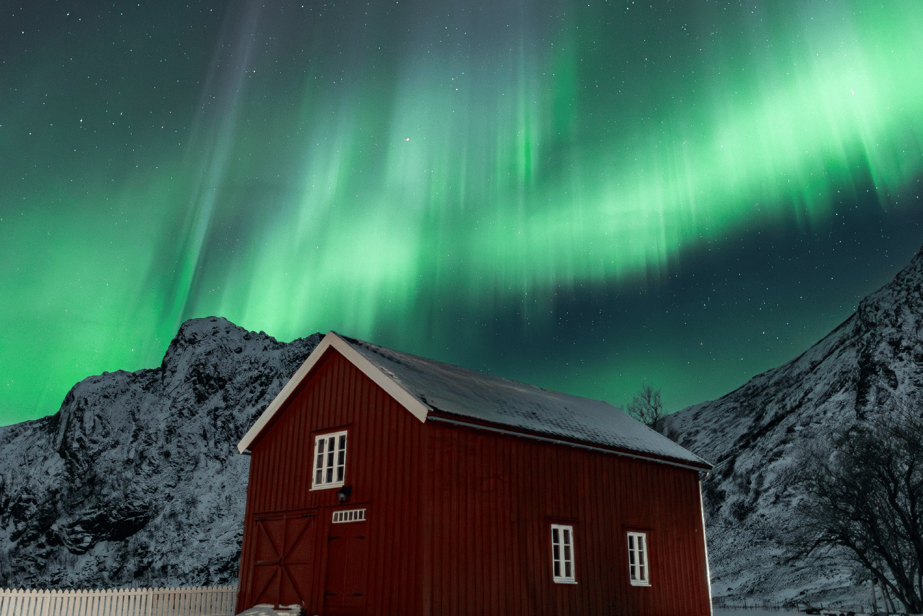 Northern lights over a fisherman’s cabin